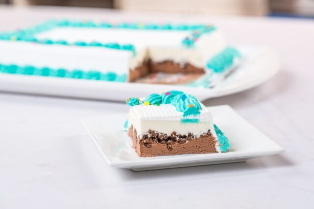 cut ice cream cake on plate